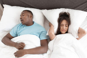 snoring man sleep apnea concept